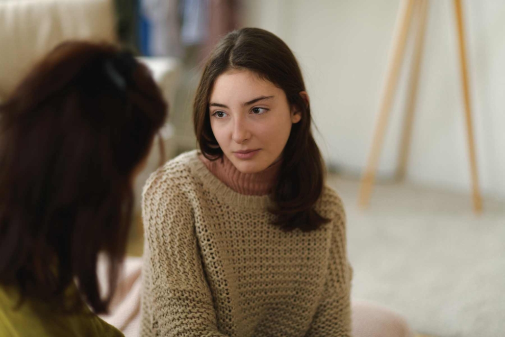 teen looking at parent