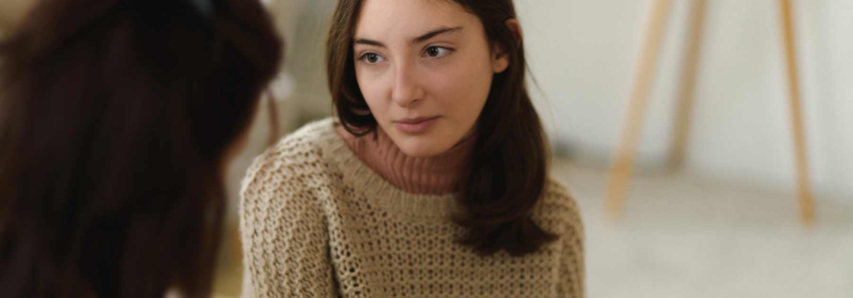 teen looking at parent